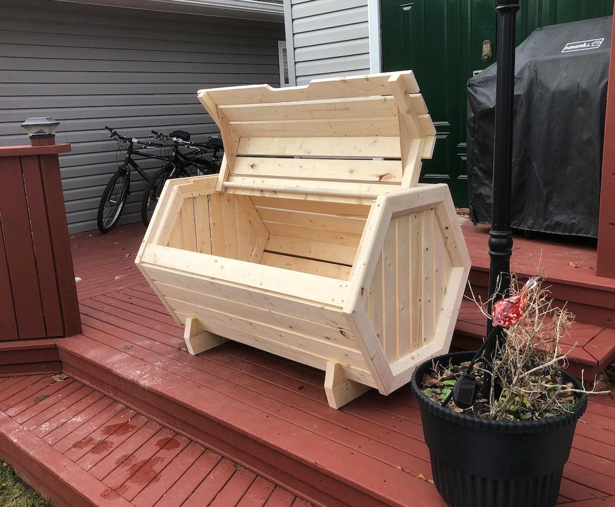 Showing cover open on the hexagon storage bin from out hexagon storage bin woodworking diy plan